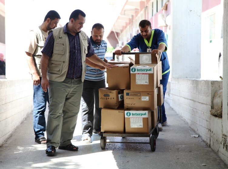 restocking healthcare facilities Interpal staff deliver vital medical aid to a Palestinian clinic
